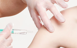 Why does fever occur after vaccination?