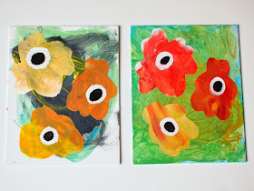 kid made contact paper stenciled flowers