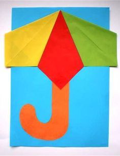 Manualidad para niños paraguas con papel glacé de colores