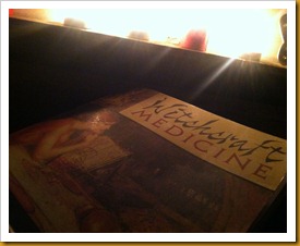 Reading by candle light.