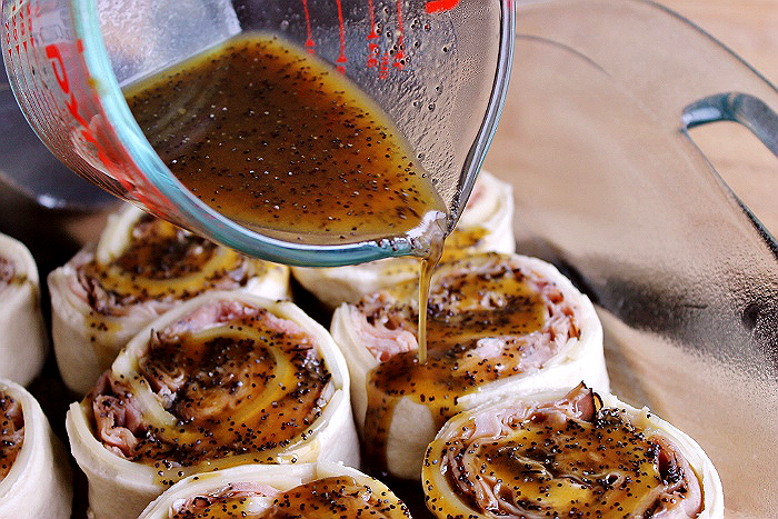 Baked Ham + Cheese Wheels With Dijon Glaze