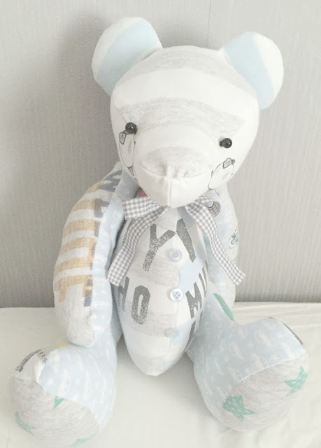 bear made from old baby clothing 