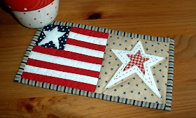 http://www.craftsy.com/pattern/quilting/home-decor/stars-and-stripes-mug-rug/49227