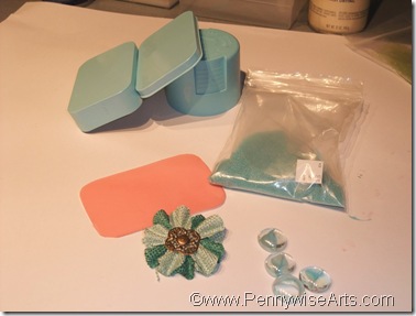 2. Cut O'So to fit lid; choose embellishments