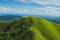 Green Hill - Photo by Traworld Official on Unsplash