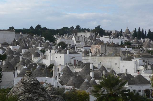 Alberobello, the city of drystone dwellings known as trulli , is an exceptional example of vernacular architecture. It is one of the best preserved and most homogeneous urban areas of this type in Europe. Its special features, and the fact that the buildings are still occupied, make it unique. It also represents a remarkable survival of prehistoric building techniques.