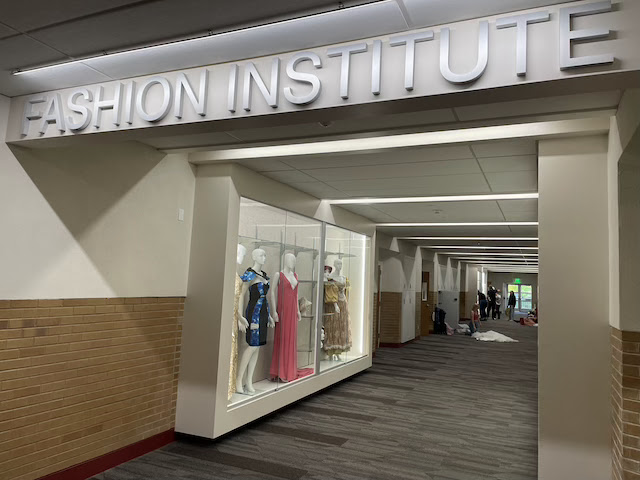 A sign that reads Fashion Institute over the hallway to the classrooms