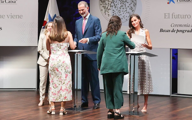 Queen Letizia wore a polka-dot belted midi dress by Laura Bernal. Queen Letizia is wearing beige leather pumps by Isabel Abdo Shoes