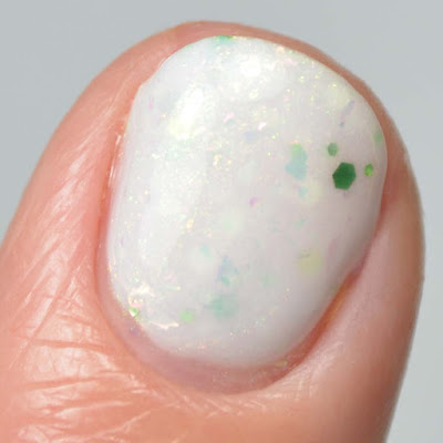 white glitter nail polish close up swatch