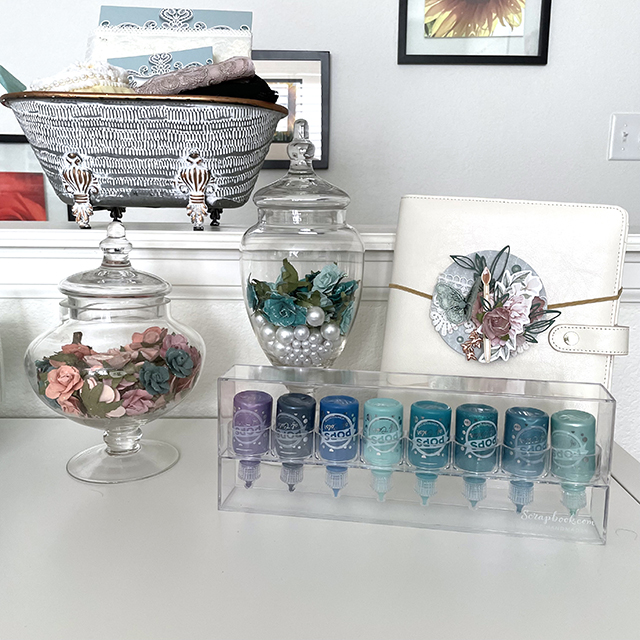 IKEA Kallax Shelves, apothecary jars, Scrapbook.com Pops of Color organizer