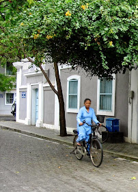 Woman cycling to work