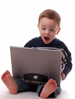 TODDLER ON LAPTOP