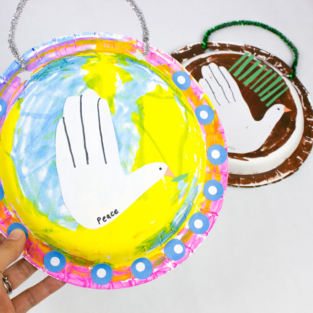 How to Make Easy Handprint Christmas Dove Art using Paper plates- such a sweet Christmas craft for kids