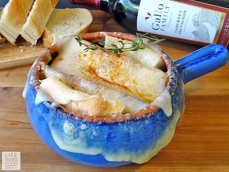 Cheesy French Onion Soup | by Life Tastes Good is a delicious blend of caramelized onions, herbs, toasted garlic bread, and lots of melty cheese. #SundaySupper #ComfortFood