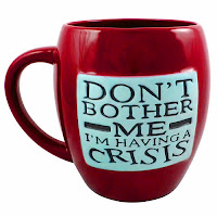 Photo of "Don't bother me I'm having a crisis" burgundy mug