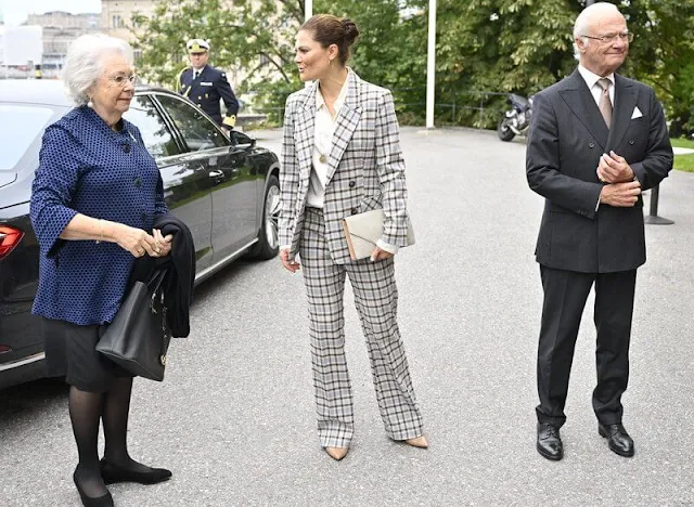 King Carl XVI Gustaf and Princess Christina. Crown Princess Victoria wore a Karah grey checkered blazer from By Malina