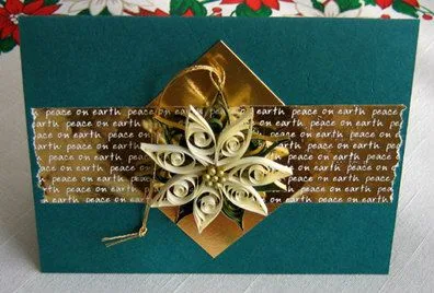 quilled poinsettia tree ornament on handmade card