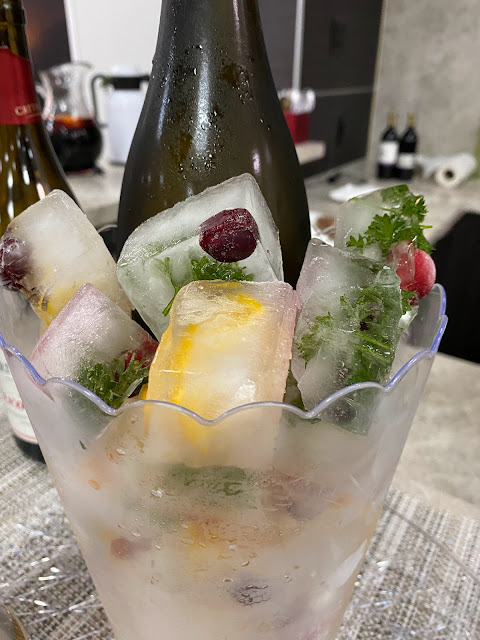 ice cubes with berries and mint