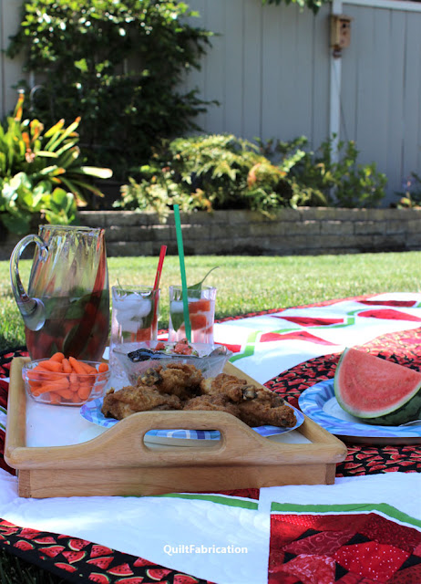 picnic lunch and drinks on Watermelon Delight quilt by QuiltFabrication