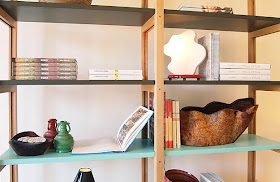 bookcase with blue shelf