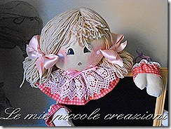 bambola su lavagnetta