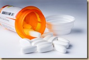 Pill_bottle_and_pills