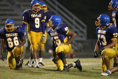 the Trojan D-Line: Terrence Jones (66),Carl Redd (9),Jonathon Stevenson (45 & Chaz Damon (73)