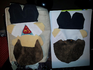 First stage with the two halves each with the different parts sewn or pinned together for Superman