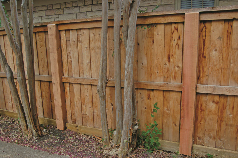 Building a Wood Fence with Metal Posts