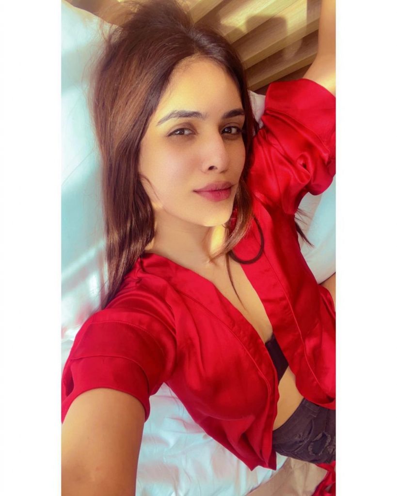 Actress Pics: Neha Malik Unique Styling Of Denim Shorts With A Satin Robe