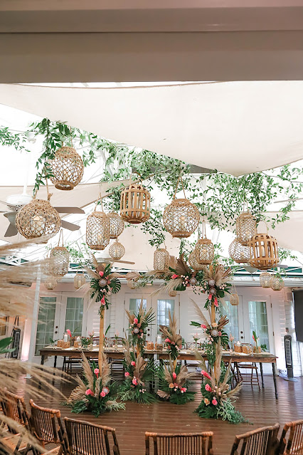 floral arch and boho wedding decor in swfl