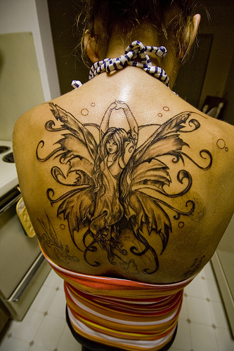 Large Back Tattoo of Fairy on Female. Previous Article Next Article