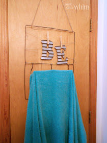 Garment Hanger Bag Repurpsoed as Towel Bar | Vintage Farmhouse Bathroom Makeover | Denise on a Whim