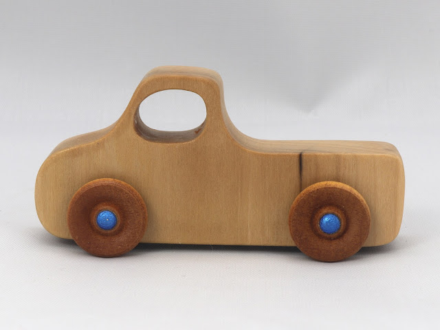 A handmade Wood Toy Pickup Truck from the Play Pal Series Finished with Clear and Amber Shellac