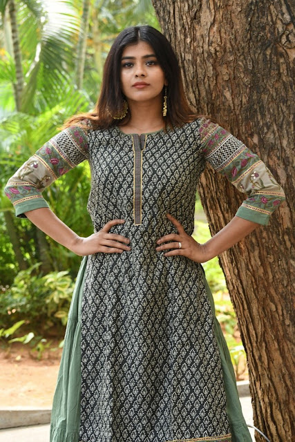 Tollywood Actress Hebah Patel Sexy Image in Green Dress