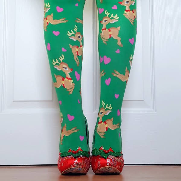wearing green Christmas tights with festive red shoes