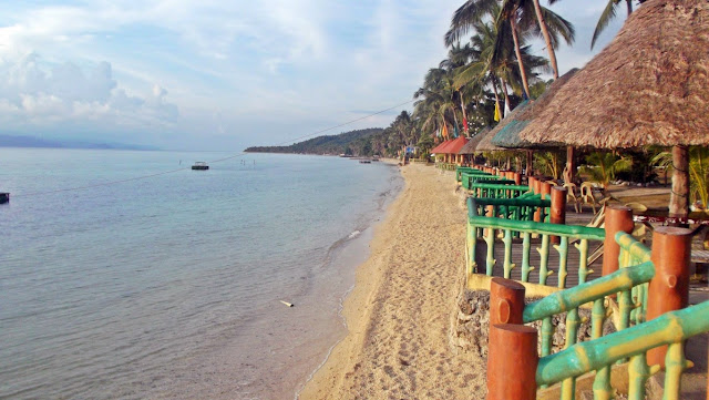 beautiful morning view of the beach and the sea from on of the kiosks at Haven of Fun Resort in San Antonio, Dalupiri Island, Northern Samar