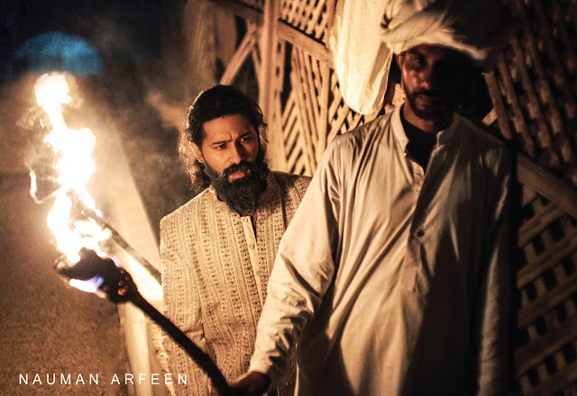 Nauman Arfeen for Diva Magazine ft. Model Abbas Jafri in a mughal attire and holding a court in a fort like a nawaab