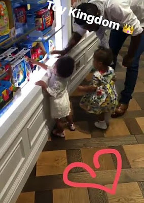 Photos: Mikel Obi takes his twin daughters toy shopping in their 1st birthday today 