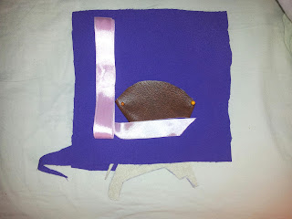 Colour test for fabrics for L for luggage purple background pale pink L, brown fake leather for luggage (darker)