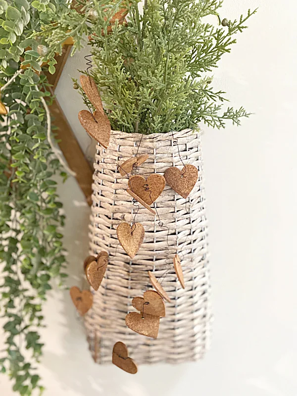 rusty heart garland on basket