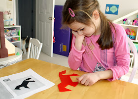 Earlier in the week, we read "The Warlord's Puzzle." Tessa completed a horse tangram on Friday, which I thought was a good way to tie the book and our Chinese New Year theme together.