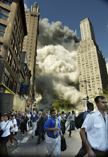 Smoke from the Twin Towers engulfes the city