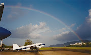 PSY: A DC3 basks in a gorgeous rainbow left in the wake of a passing . (vi's )