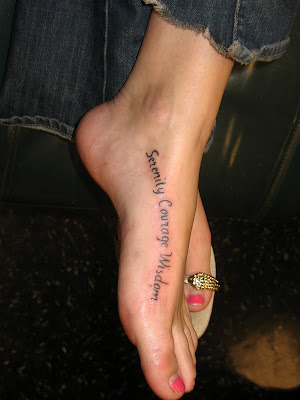 Positive inspiration words foot tattoo.