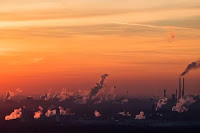 Industrial Smokestacks (Credit: Lukas Schulze / Getty Images) Click to Enlarge.