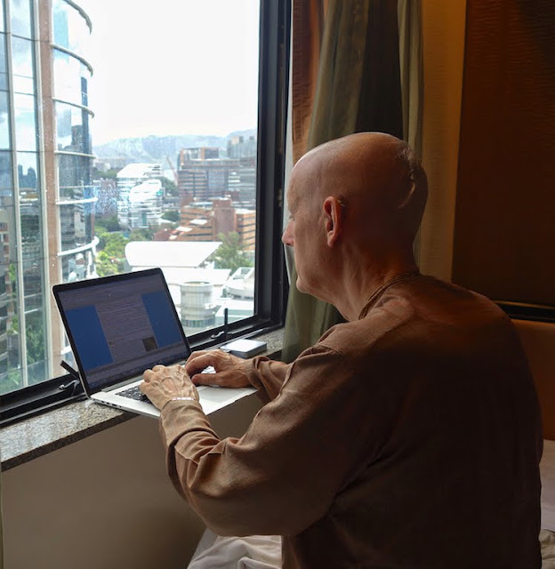 Sankarshan Das Writing "Thought for the Day" in Hong Kong