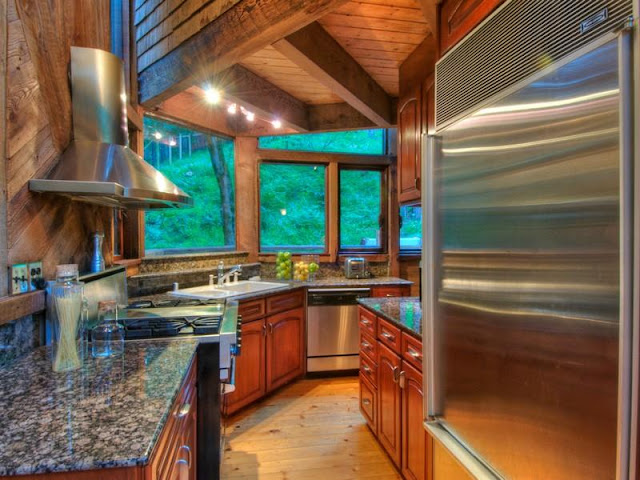 Photo of kitchen inside of tree house in the forest