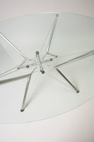Clean and modern v-star tensegrity glass table