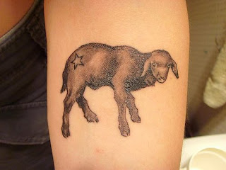 sheep tattoo on hand